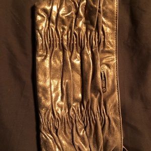 Gold Michael Kors evening clutch brand new.